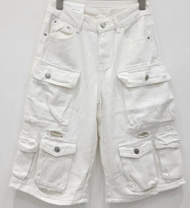 Bermuda Cargo Denim in white, distressed with multiple pockets, high waist, and zipper closure | SuzzaneMarket