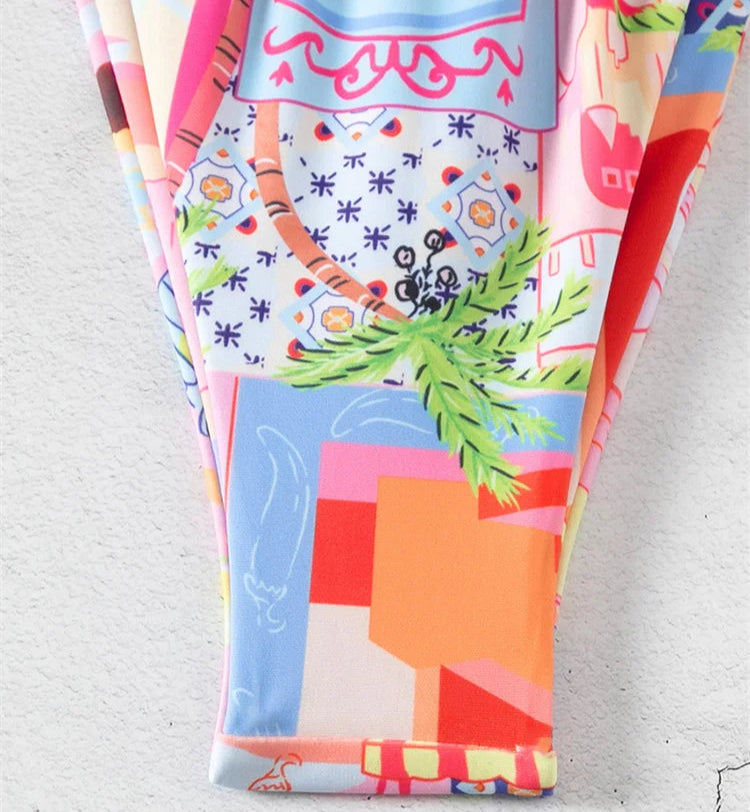 Colorful printed fabric of Mini Brésilien Tanga with floral patterns and vibrant designs | SuzzaneMarket