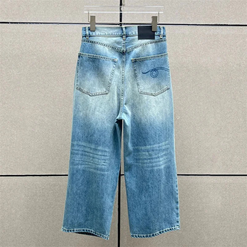 Y2K wide-leg high-waisted jeans in light blue denim with knee seams, non-stretch, ankle length | SuzzaneMarket