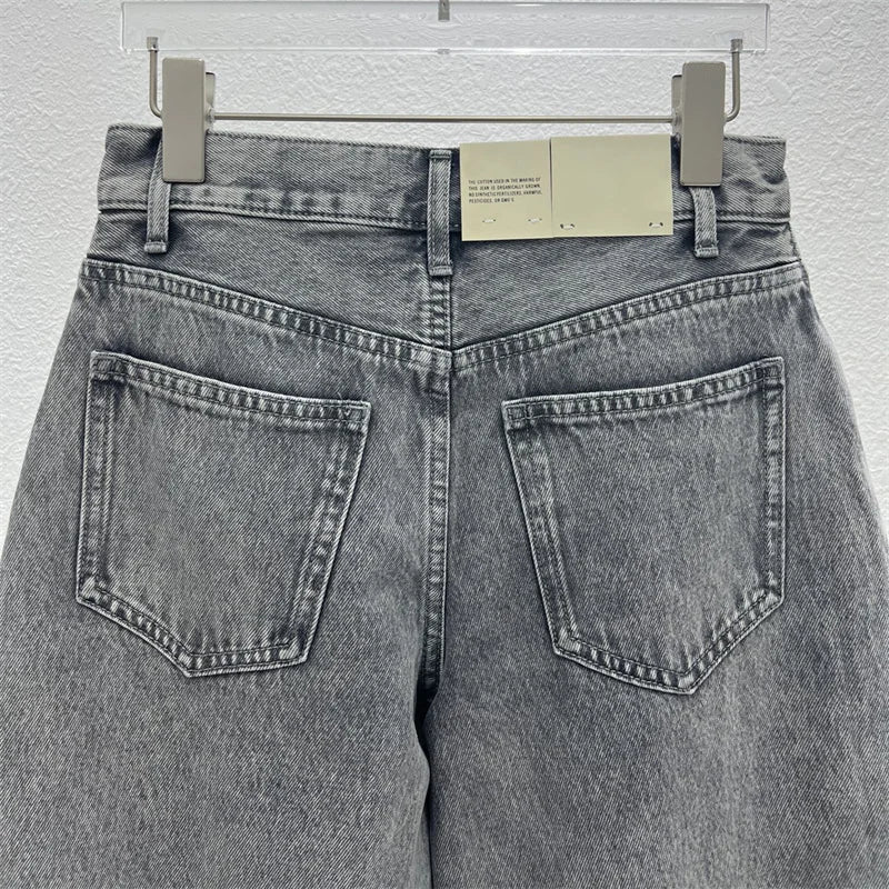 Back view of gray denim banana jeans with wide legs and high waist | SuzzaneMarket.