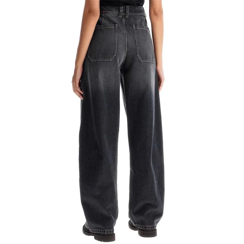 Back view of high-waisted wide-leg denim jeans in dark wash, showcasing large banana style. |SuzzaneMarket