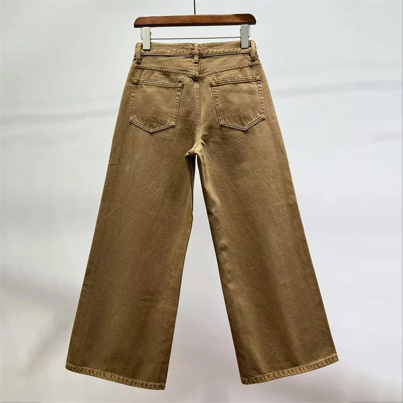 Back view of large Y2K camel denim jeans with wide legs and high waist | SuzzaneMarket