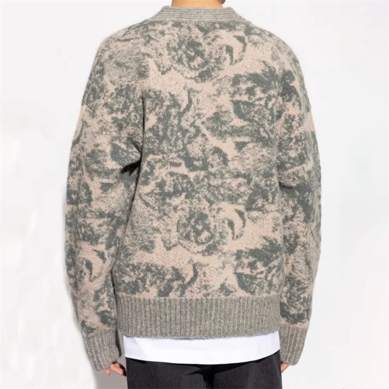 Back view of a stylish green and beige patterned cardigan, showcasing its soft texture and loose fit |SuzzaneMarket
