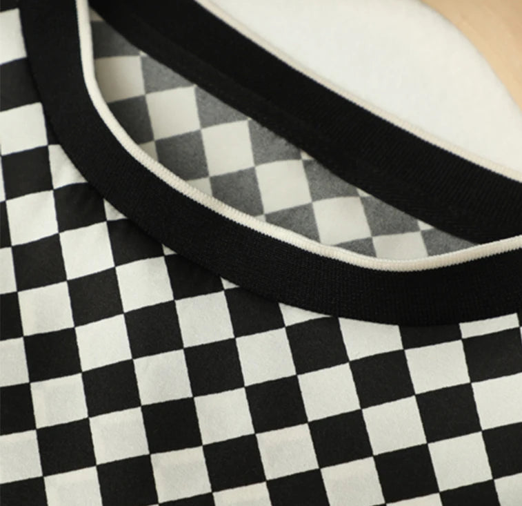 Close-up of a black and white checkered shirt collar design |SuzzaneMarket