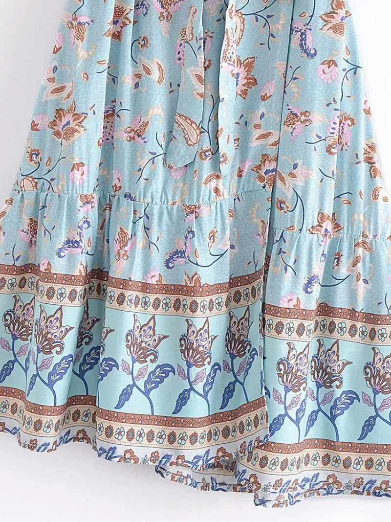 Robe Plage Bohème HAPI, légère, haut croisé, taille haute marquée, en tissu Rayonne Modal, motifs floraux.