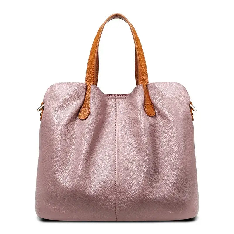 Sac shopping en cuir grainé rose avec anses en simili cuir marron, grande capacité et design élégant.