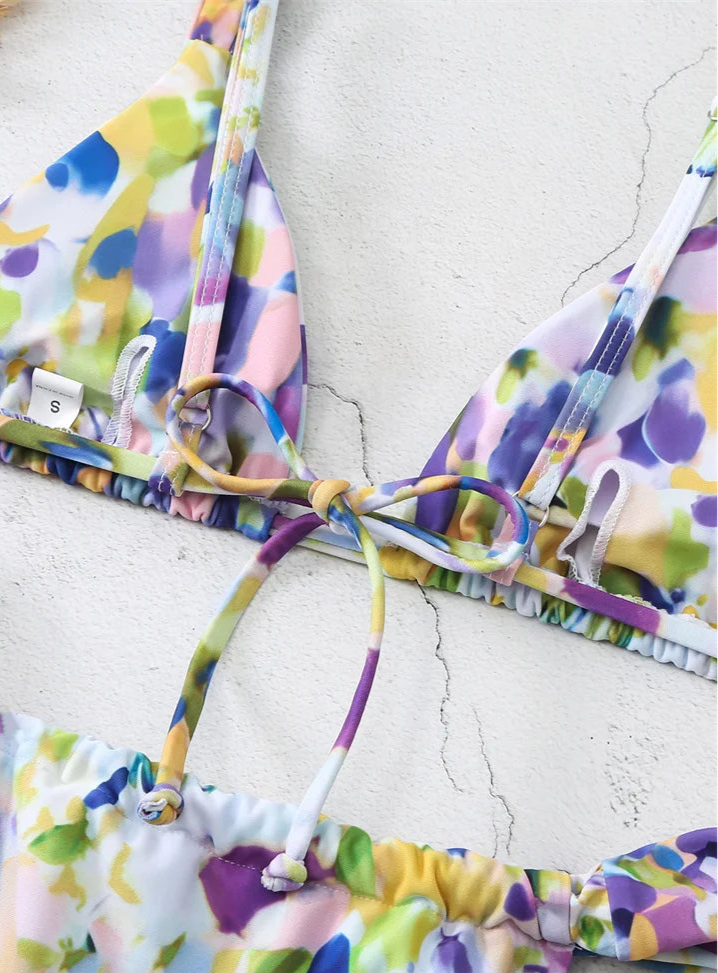 Mini Brésilien Tanga bikini in floral print with adjustable triangle top and tie-back | SuzzaneMarket