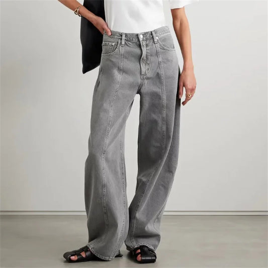 Wide-leg gray banana jeans for women in denim, high-waisted fit. Shop now at SuzzaneMarket.