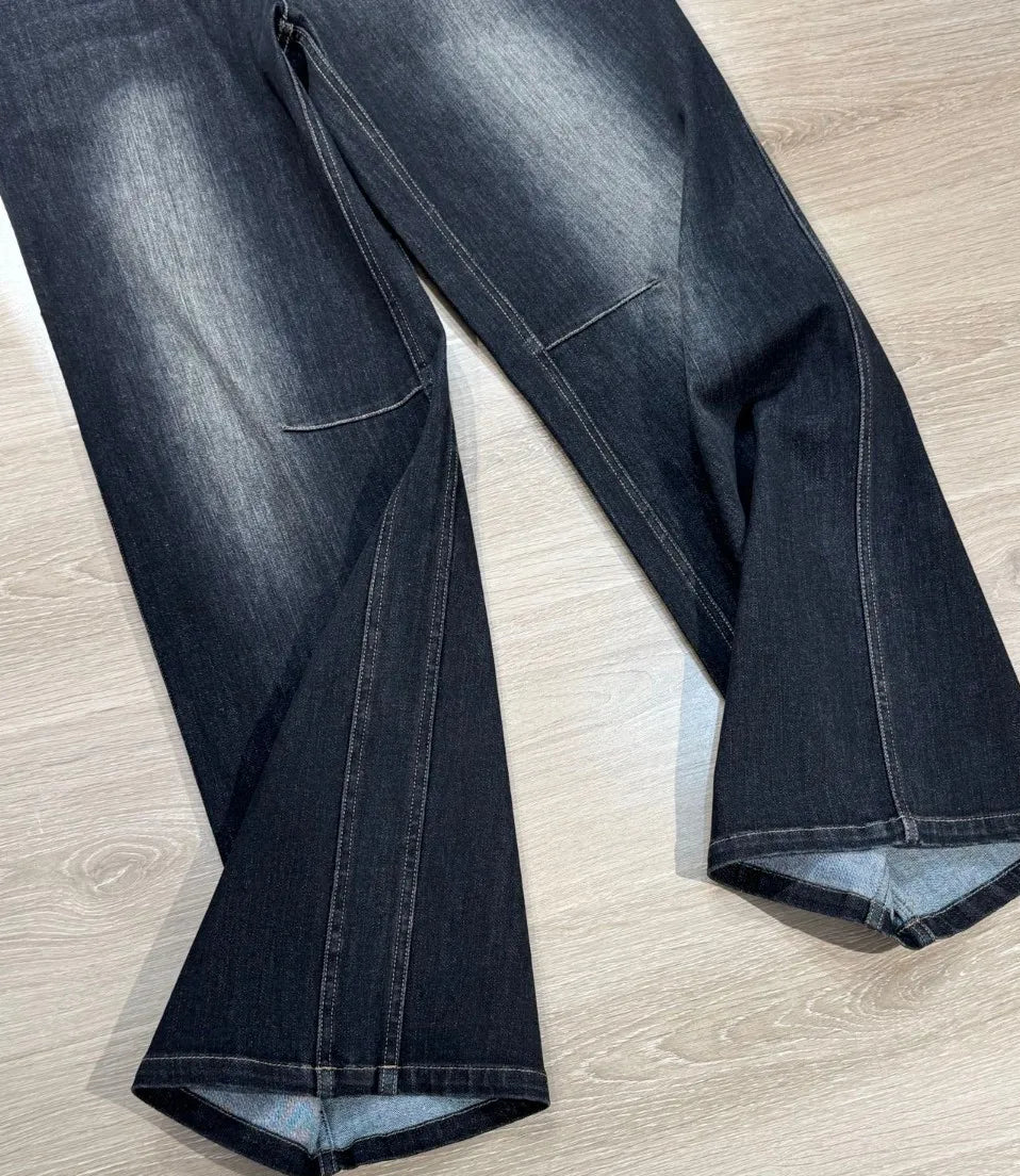 Flared denim jeans in dark wash, featuring high waist, knee stitching, and double stitching details | SuzzaneMarket