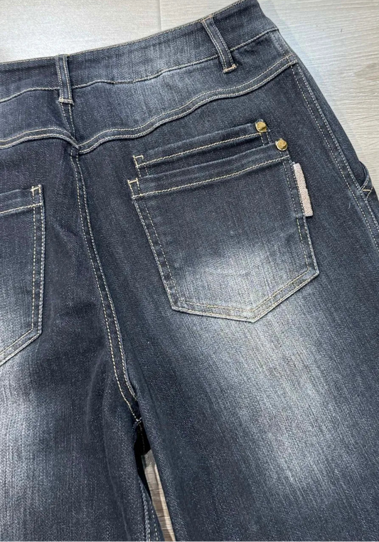 Flared denim jeans with a high waist and back pockets, featuring double stitches and a slight stretch. | SuzzaneMarket