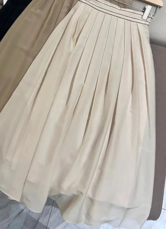 Long pleated cream skirt with elastic waistband, made of soft silk chiffon, stylish design | SuzzaneMarket