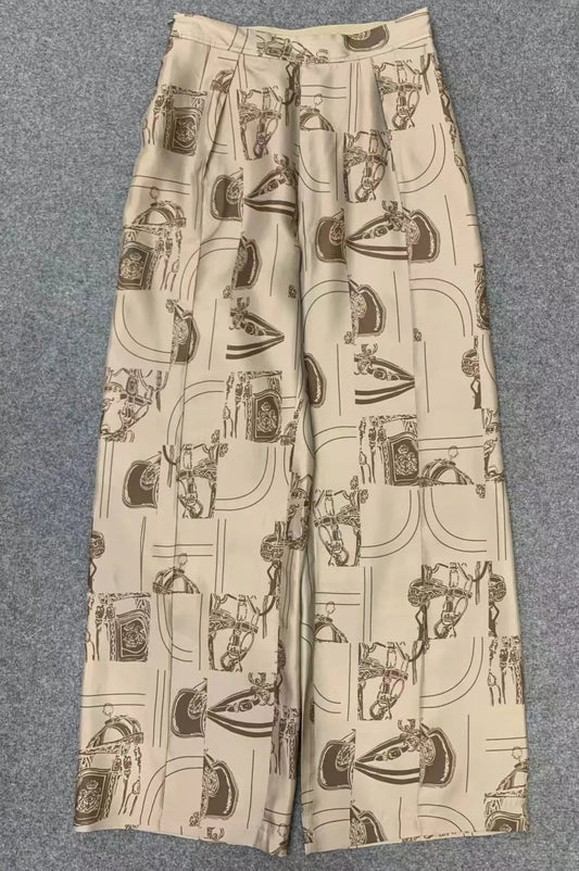 Pantalon large en soie avec motif unique, longueur cheville, poche latérales, fermeture zippée sur le côté | SuzzaneMarket