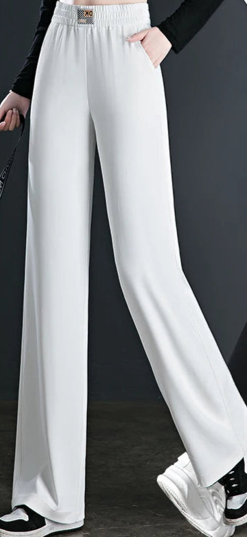 Pantalon droit blanc en mélange coton stretch, taille élastique, infroissable, et confort. |SuzzaneMarket