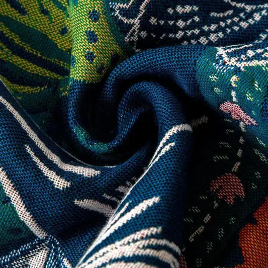 Zoomed in view of JUNGI cotton beach towel with vibrant, tropical prints, ideal for quick-drying and lightweight use | SuzzaneMarket