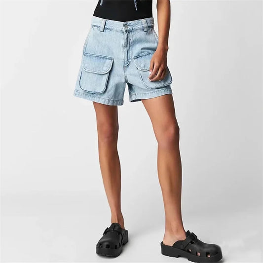 Short cargo denim shorts in light blue with pockets, high waist design, styled with black footwear | SuzzaneMarket