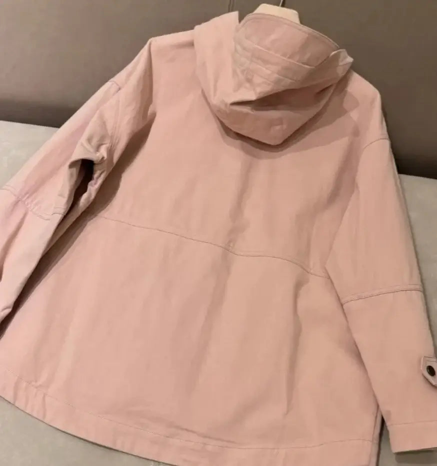 Back view of a pink trench court coat with a hood, showcasing its water-resistant cotton fabric. | SuzzaneMarket