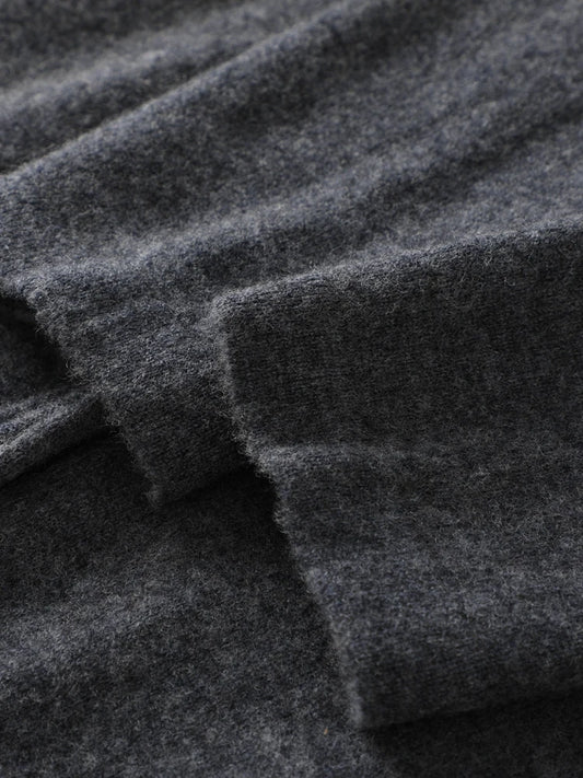 Texture of soft gray cashmere fabric showcasing elegance and luxury | SuzzaneMarket