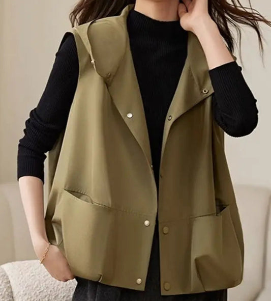 Oversized sleeveless windbreaker vest with hood and front pockets in green | SuzzaneMarket