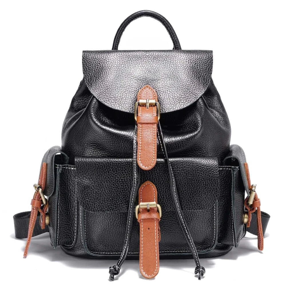 Sac à dos en cuir grainé noir de CAMPER avec poches extérieures, parfait pour camping. Disponible sur Suzzanemarket.