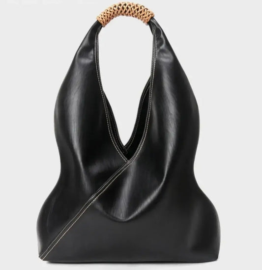 Sac shopping ELRA en cuir noir, grande poche ouverte, anse gainée. Disponibile chez Suzzanemarket.