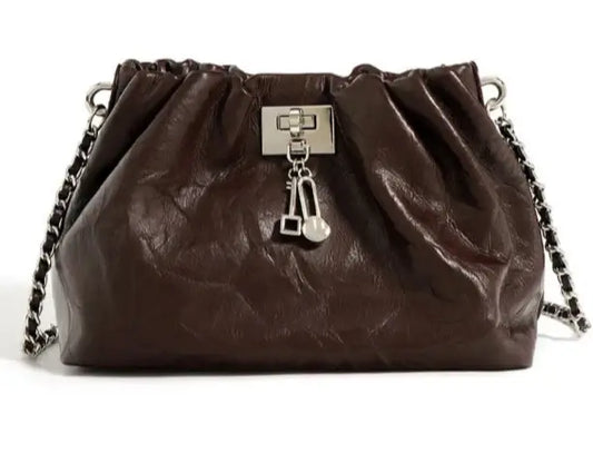 Petit Boule Cuir Froissé sac en cuir effet froissé, fermeture boucle, chaîne d'épaule. Disponible en 4 couleurs. SuzzaneMarket.