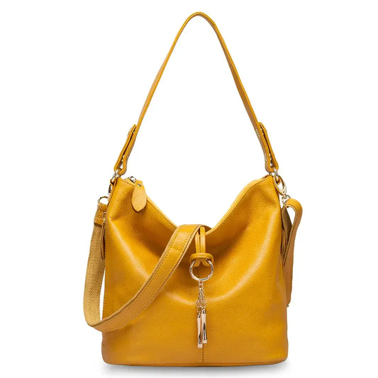 Sac hobo cuir grainé jaune TILIS avec double anse, fermeture zipper et boucle décorative.